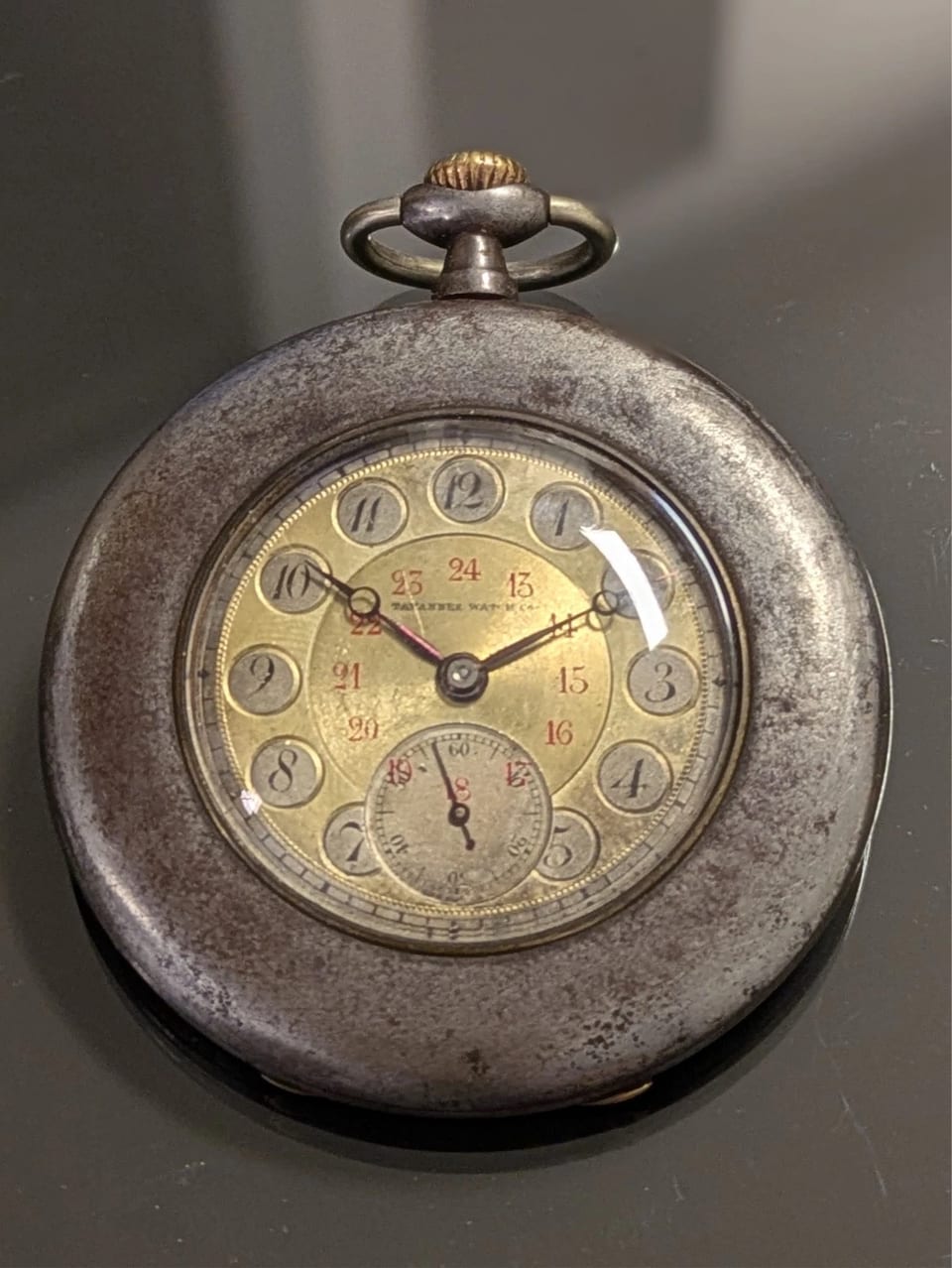 Montre de poche Tavannes Watch Co. en fer couleur bronze, vers 1920, en état de marche