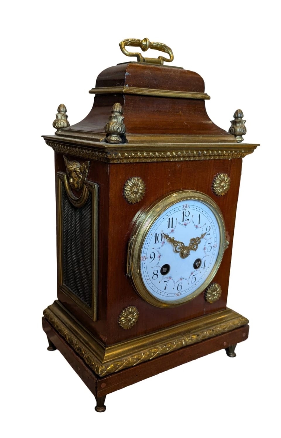 Reloj de chimenea de la época de los fundadores con herrajes de latón, que da las horas con un gong, hacia 1900